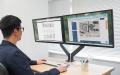 工具不要でスムーズにモニターの高さや角度、位置が調