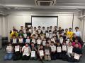 地域企業から「稼ぐ」の意味を学び、中高生が小学生向 地域企業から「稼ぐ」の意味を学び、中高生が小学生向
