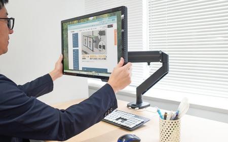 工具不要でスムーズにモニターの高さや角度、位置が調