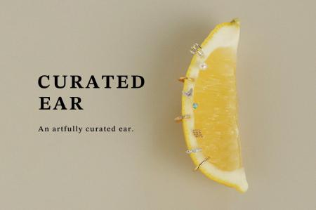 華奢なピアスを重ねて楽しむ「キュレイテッドイヤー」