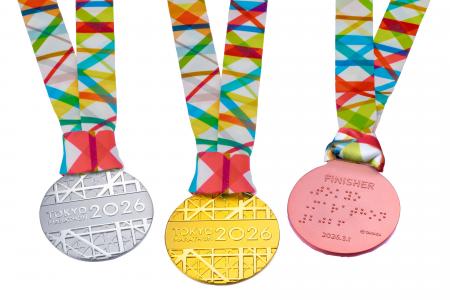 線の織り重なりで大会に関わる一人ひとりを表現した「