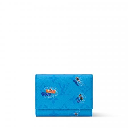 【ルイ・ヴィトン】モノグラム・キャンバスを背景にス