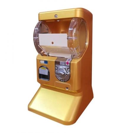 きらめく金色の「トイカプセルマシン」、期間限定値下