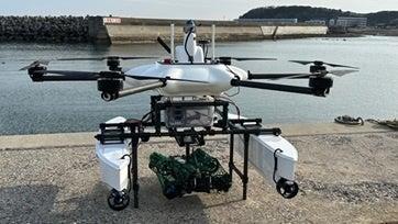 水空合体ドローンと音響測位装置を用いた防波堤の遠隔 水空合体ドローンと音響測位装置を用いた防波堤の遠隔