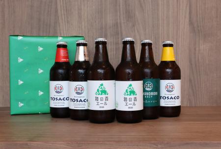 ビールを贈って、森を育てる。売上の3%を森林保全基 ビールを贈って、森を育てる。売上の3%を森林保全基
