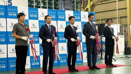 地区宅便の物流センターにて、ROMSの自動倉庫「ナノ・ 地区宅便の物流センターにて、ROMSの自動倉庫「ナノ・